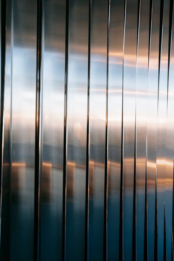 Glossy metal facade of modern building